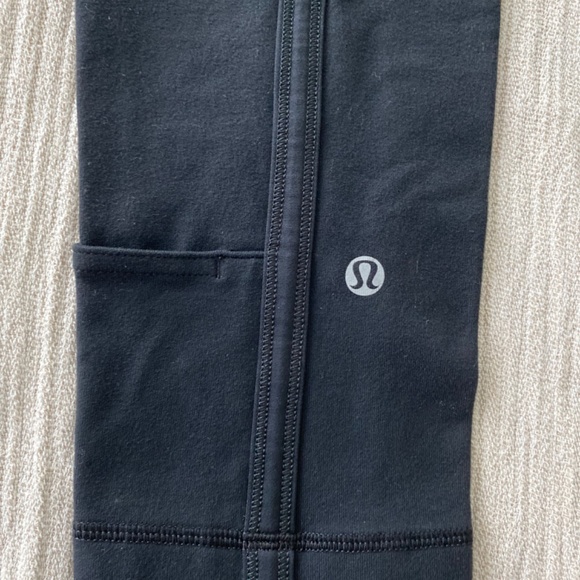 Lululemon Black Leggings Size 2, pocket at left lower leg - Picture 4 of 5